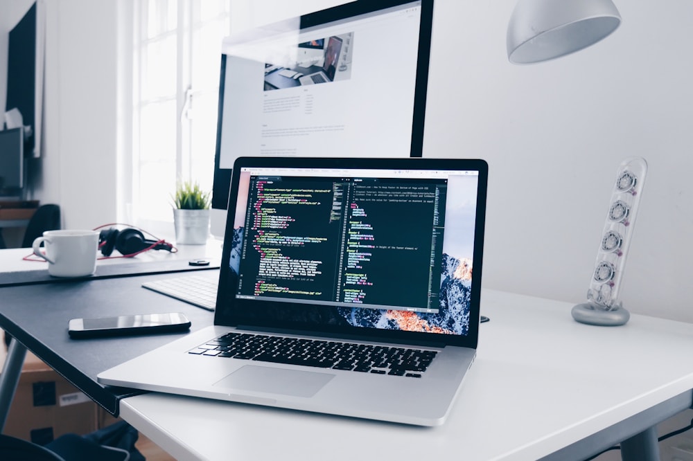 Person learning software development on a laptop